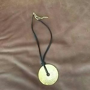Hammered medallion w leather cord
